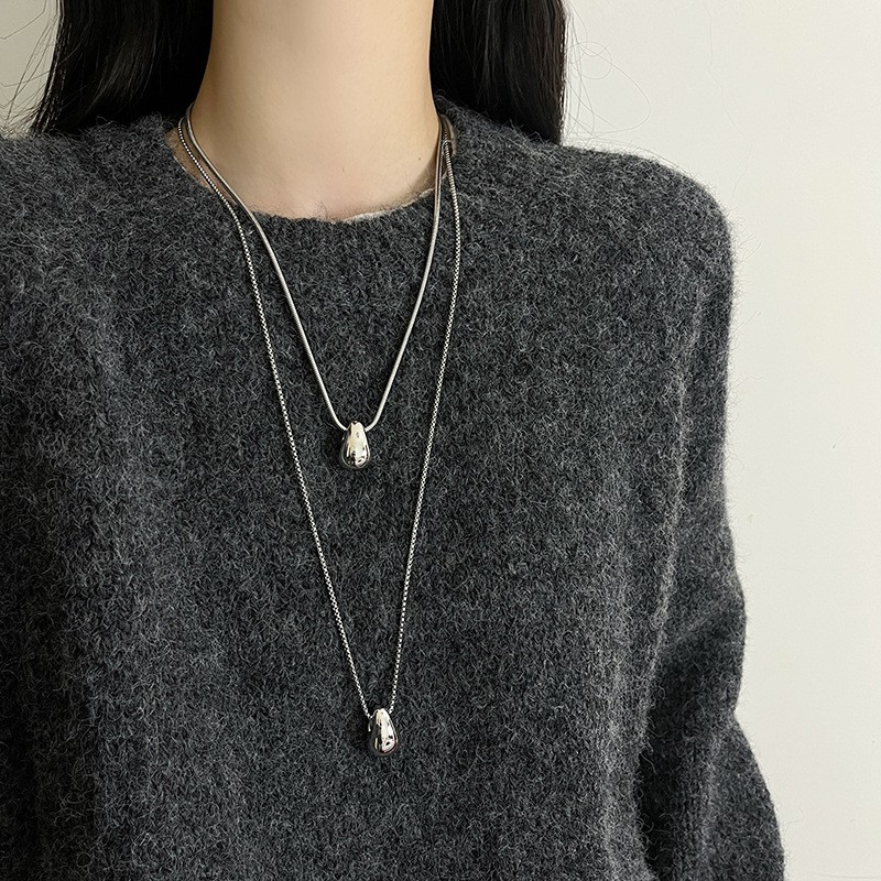 Luxury Minimalist Snake Bone Chain Teardrop Pendant Necklace Luxury Minimalist Snake Bone Chain Teardrop Pendant Necklace
